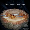 Chainsaw earrings on wooden slab